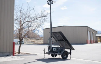 Solar camera trailer parked on a commercial lot